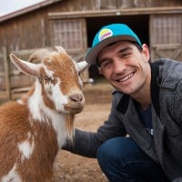jonah goldman with a goat